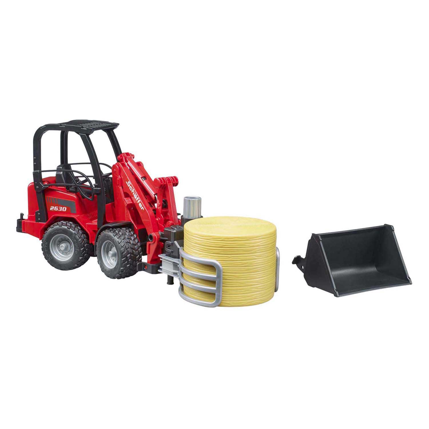 Bruder Schaffer Compactlader 2630 met Hooibalengrijper