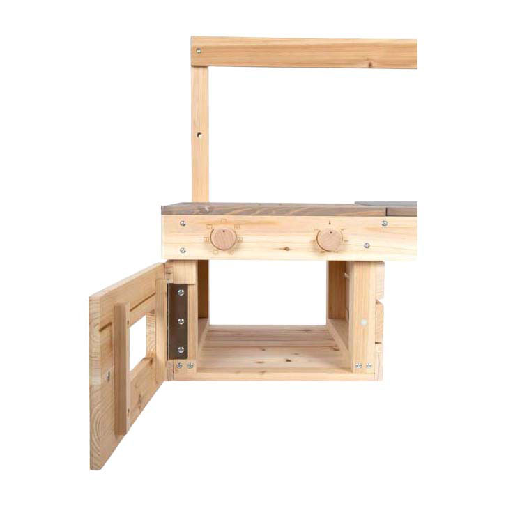 Petite cuisine surélevée en bois et en terre battue